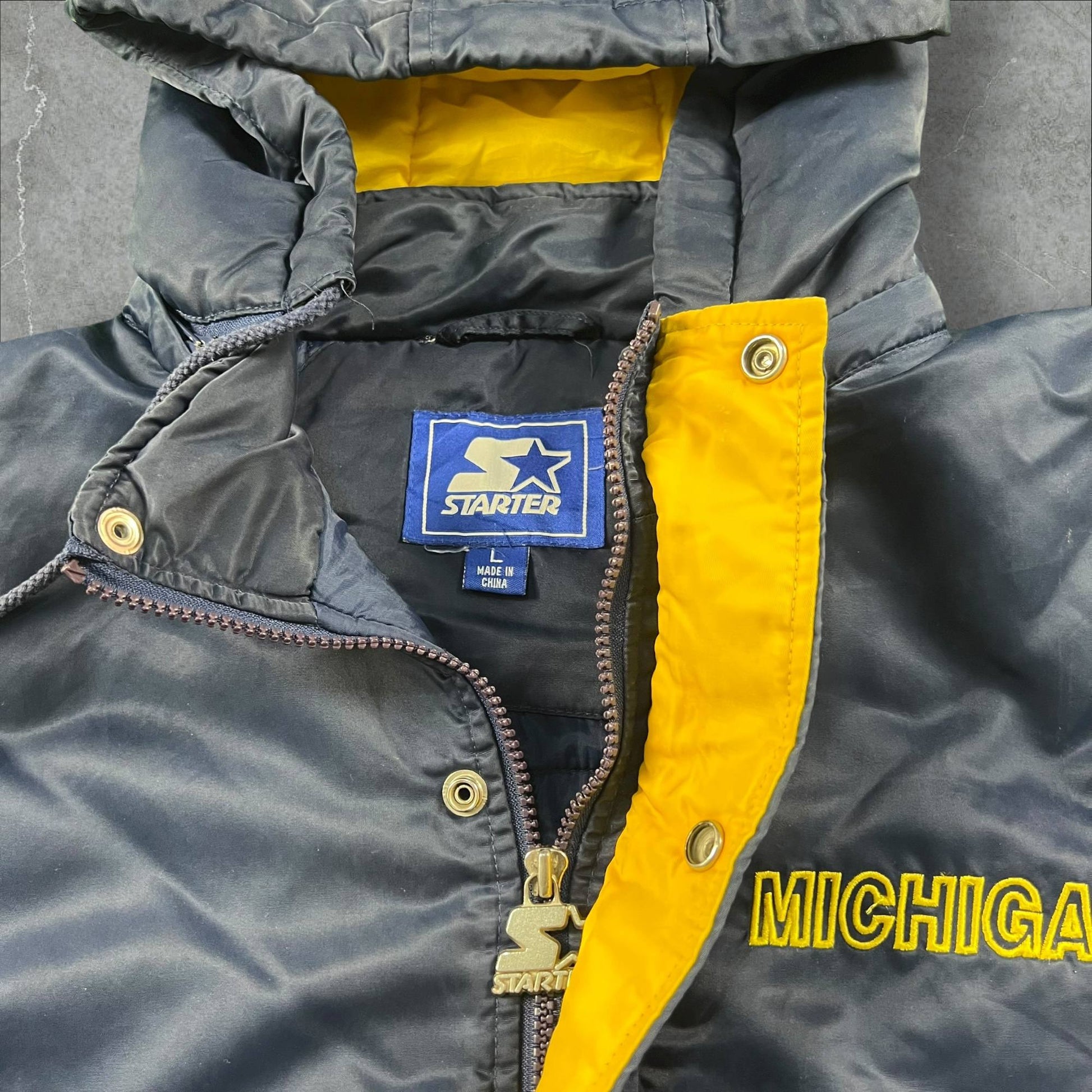 Giubbotto vintage Starter NCAA Michigan Wolverines Starter