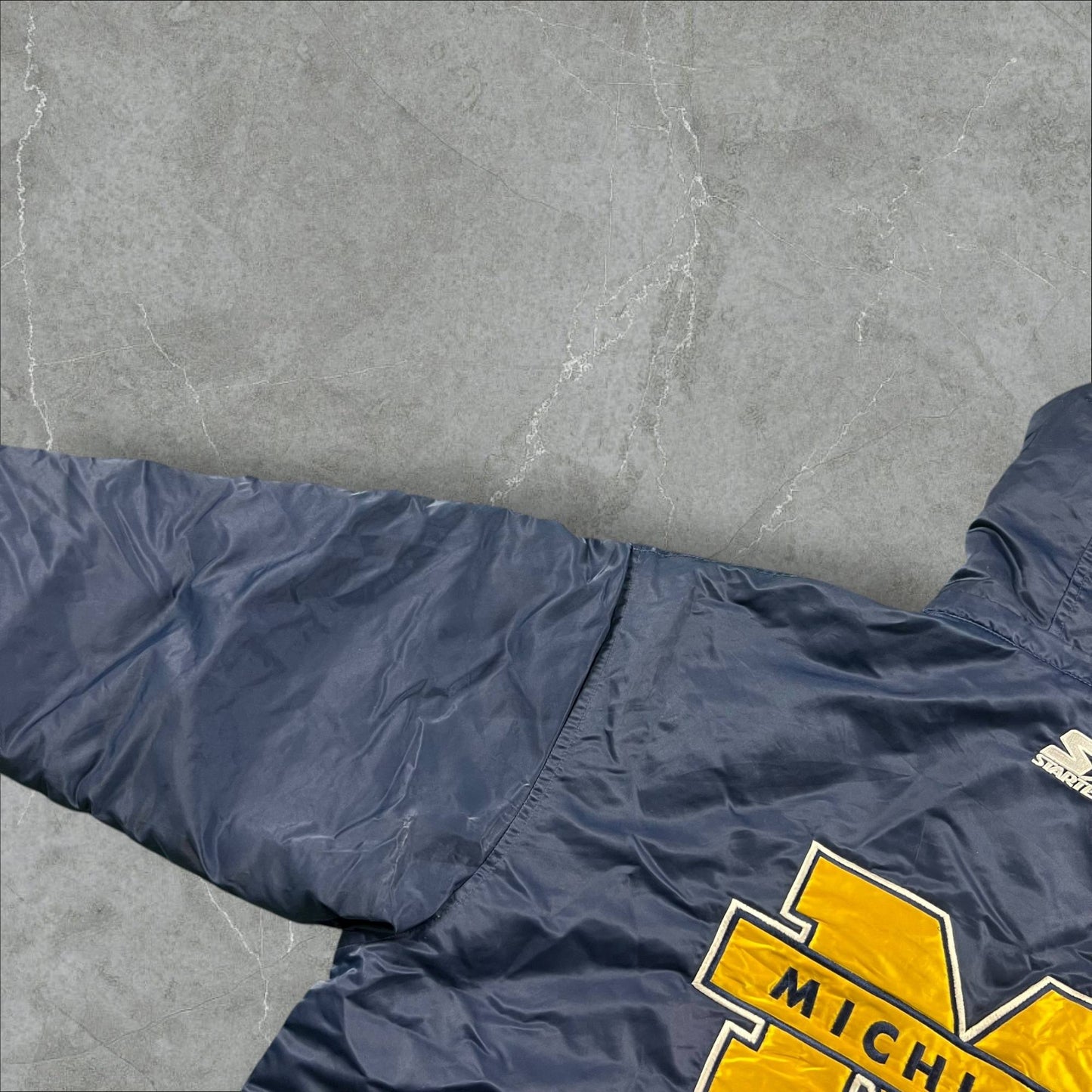 Giubbotto vintage Starter NCAA Michigan Wolverines Starter